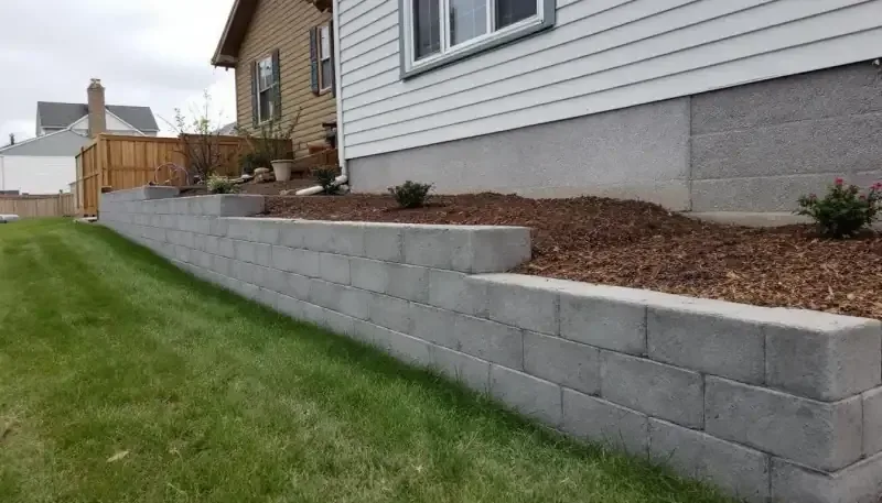 Concrete retaining wall and patio combination in Lee's Summit, MO
