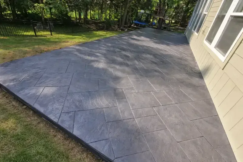 Stamped concrete with hand-applied antiquing release in Saint Joseph, MO
